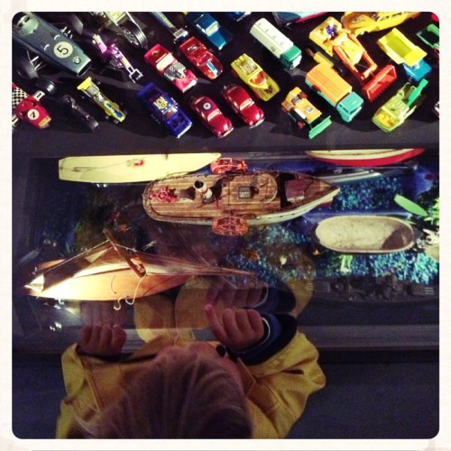 little-boy-pointing-at-toy-cars