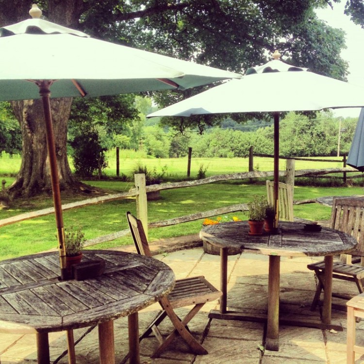 pub-tables-outside-with-parasols