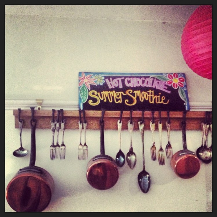 cutlery-hanging-along-a-shelf