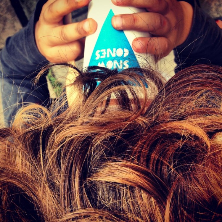 Drinking Delicious Dregs at Stan's Snow Cones child-drinking-from-paper-cup